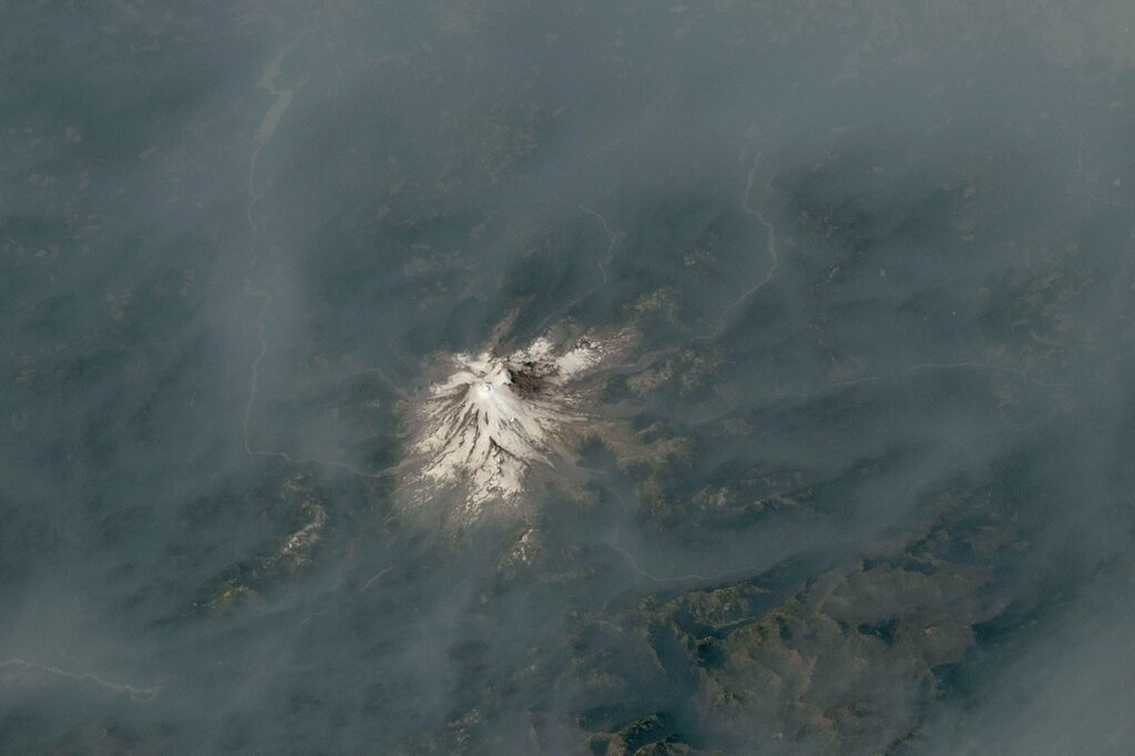 Cascade Volcano Shrouded in Smoke: Stunning Pacific Northwest View