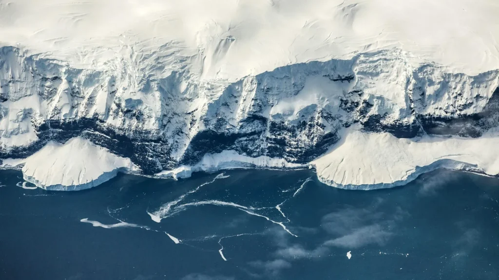 Why Forces Deep Within Earth Froze the South Pole Before the North Pole